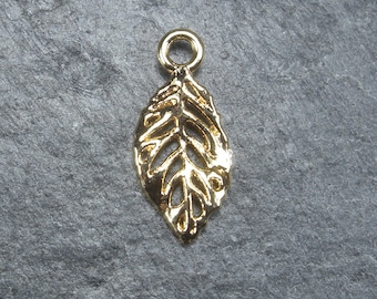 1 tropical leaf pendant, brass, 14 carat gold plated, 10511