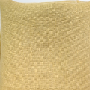 Könnte beinhalten: Nahaufnahme eines Stücks beigefarbenen Stoffes mit gewebter Struktur.