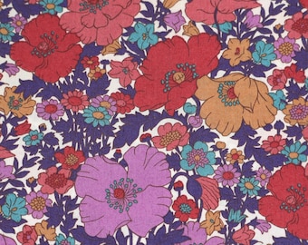 May include: A close-up of a floral fabric with a white background. The fabric features large red, pink, and orange poppies, along with smaller flowers in shades of purple, teal, and yellow. Dark purple leaves and stems are also visible.