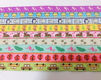 May include: Assortment of colorful ribbon trims featuring various animal and nature-themed designs. The ribbons include images of unicorns, frogs, penguins, foxes, deer, paw prints, flamingos, ladybugs, and school buses.