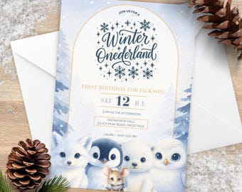 May include: A light blue invitation with the text "Winter Onederland" and snowflake accents. The invitation includes the date, time, and location for a first birthday party. The bottom of the invitation features illustrations of arctic animals.