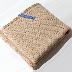 light baby blanket made of fine wool (merino) in beige / merinowool babyblanket