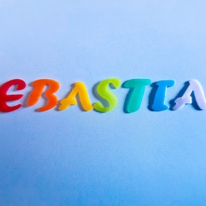 Regenbogen Wachs-Buchstaben Zahlen Bild 1