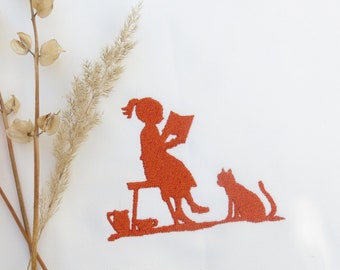 Embroidered tea towel organic cotton GOTS paper cut reading book girl cat kitchen