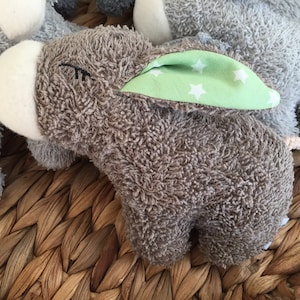 Mini donkey with desired ears as a cuddly toy or rattle Brown