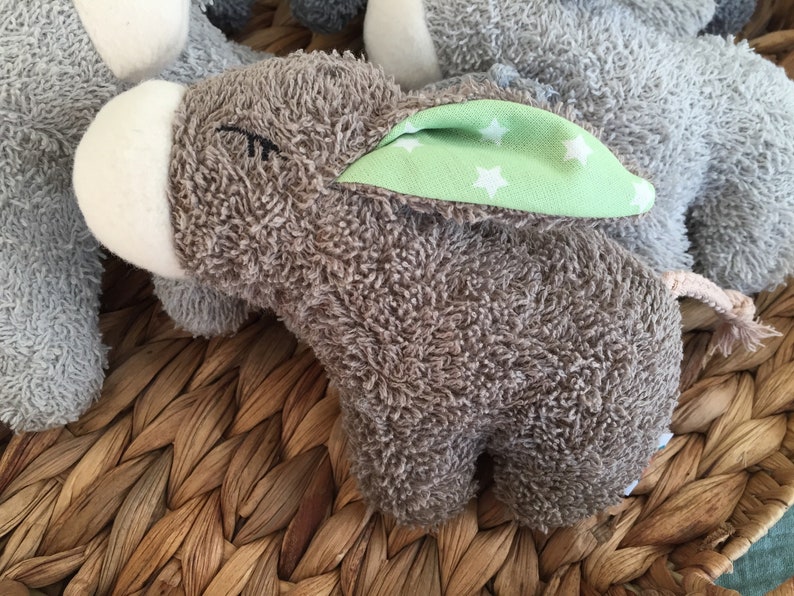 Mini donkey with desired ears as a cuddly toy or rattle Brown