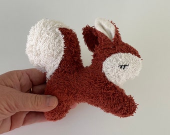 Mini squirrel as a cuddly toy or rattle