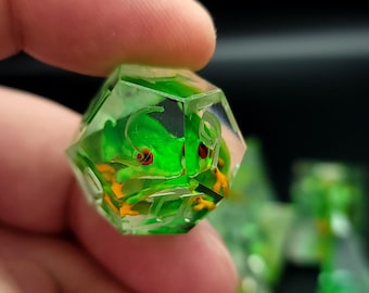 Dnd dice set with green frogs inside