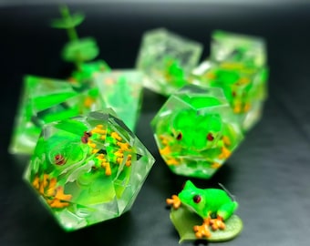Dnd dice set with green frogs inside