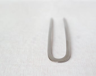 Hair fork made of titanium, forged