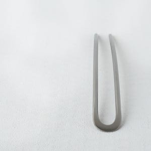 Hair fork made of titanium, forged
