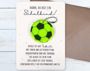 Tessera di iscrizione scolastica con catarifrangente da calcio
