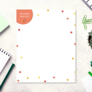 May include: A white sheet of paper with a red circle at the top. The circle has the text "Ganz pers&ouml;nlich, von mir f&uuml;r Sie." in black text. The paper is decorated with small red and yellow dots.