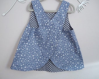 Denim blue apron dress with flowers