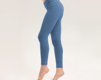 May include: A pair of blue denim leggings.