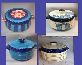 large ceramic bread crock in various blue patterns