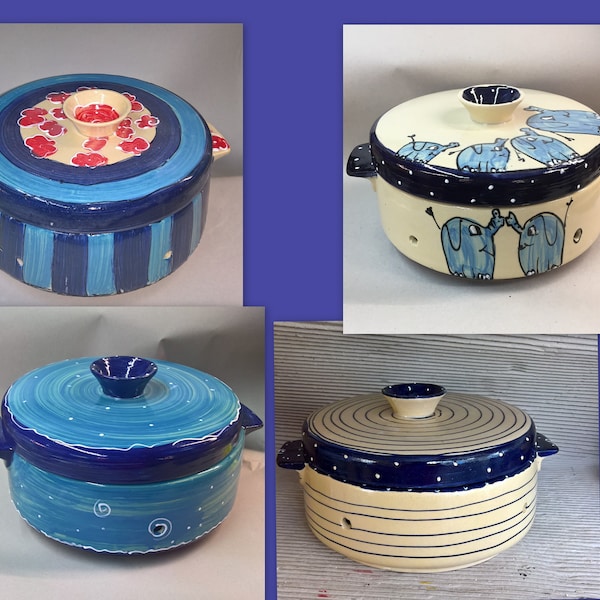 large ceramic bread crock in various blue patterns