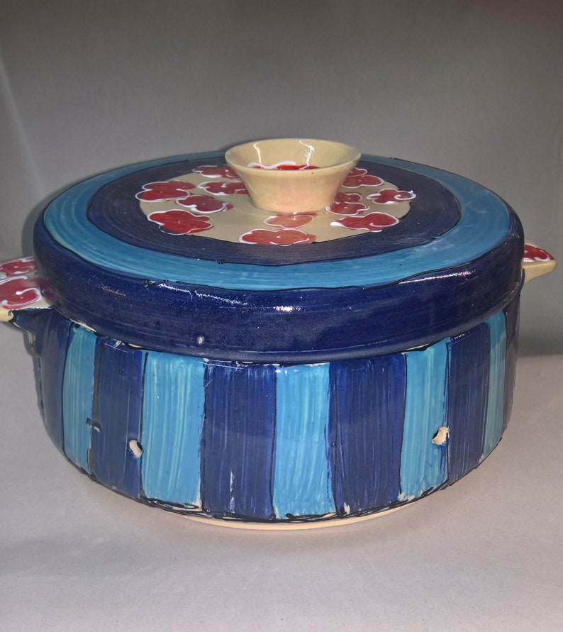 large ceramic bread crock in various blue patterns velvet