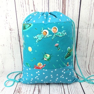Gym bag, backpack, children; cool astronauts...