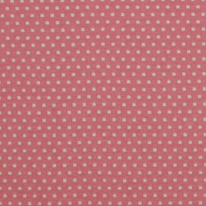Könnte beinhalten: Rosa Stoff mit einem weißen Tupfenmuster.