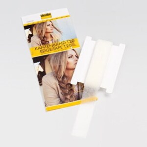 Peut inclure: Ruban adh&eacute;sif blanc pour extensions de cheveux. Le ruban est emball&eacute; dans une bo&icirc;te blanche avec le texte "KANTENBAND T20 EDGE TAPE T20" imprim&eacute; dessus.