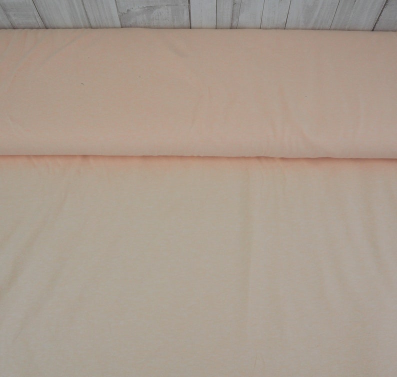 Jersey 11.40 EUR/meter melange mottled apricot Fabric sold by the meter image 1