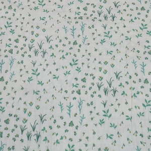 Muslin 13.20 EUR/meter print, white with small flowers in green, fabric sold by the meter