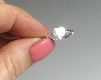 Delicate sterling silver ring with heart