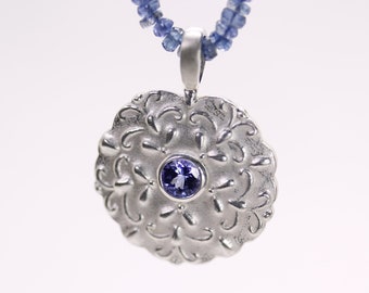 Pendant made of silver with tanzanite, chased and hammered, goldsmith's work by Kathi Breidenbach