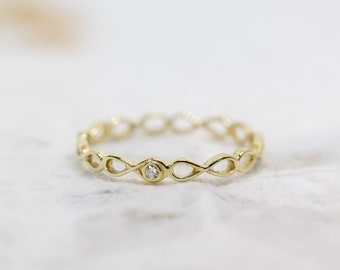 Infinity ring, symbol of infinity, friendship ring in silver or gold with brilliant-cut diamond, filigree goldsmith work