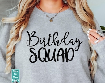Puede incluir: Una sudadera gris con el texto "Birthday Squad" en letras negras.
