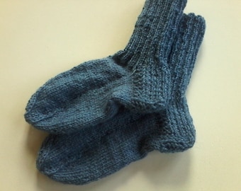 Hand-knitted baby socks with love