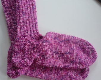 Hand-knitted baby socks with love