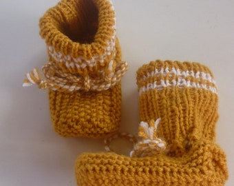 With love hand-knitted baby knitted shoes