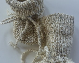 Hand-knitted baby shoes with love