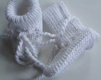 Hand-knitted baby shoes with love