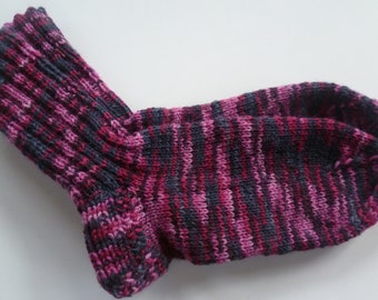 Hand-knitted baby socks with love