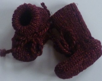 Hand-knitted baby shoes with love
