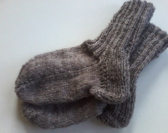 Hand-knitted baby socks with love