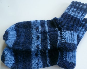 Hand-knitted baby socks with love