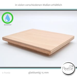 Könnte beinhalten: Ein hellfarbiges, rechteckiges Holzbrett mit glatter, ebener Oberfläche. Das Brett ist 15 mm dick und hat eine abgeschrägte Kante. Das Bild enthält auch den Text "wasserdicht" und "in vielen verschiedenen Größen erhältlich".