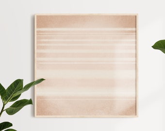 May include: A framed abstract art print with a light brown background and white horizontal lines. The frame is made of light wood.