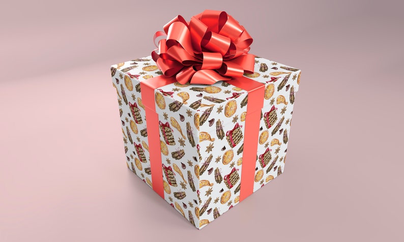 May include: A square gift box wrapped in white paper with a repeating pattern of festive illustrations in brown, red, and gold. The box is tied with a coral ribbon and topped with a large, matching bow. The background is a soft pink.