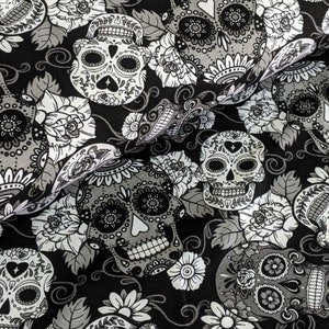 Cotton jersey Mexican skulls with flowers white/black