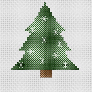 May include: A green Christmas tree with white snowflakes on a white background.