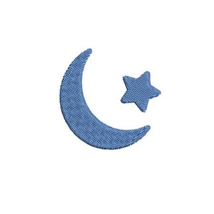 Może przedstawiać: Niebieski sierp księżyca i pięcioramienna gwiazda, oba wyszyte na materiale przypominającym denim.
