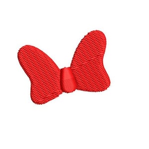 May include: A red fabric bow with a textured surface.