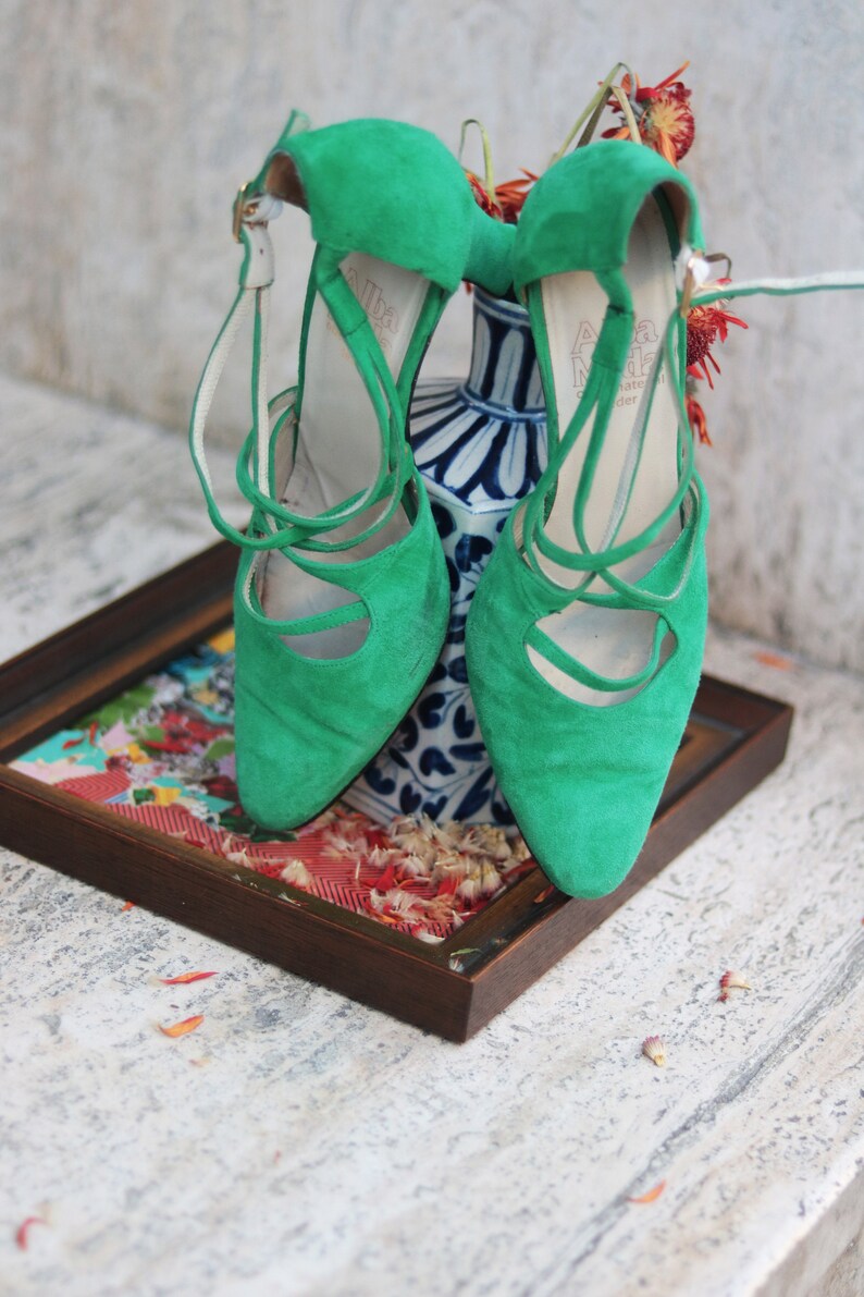 green suede pumps