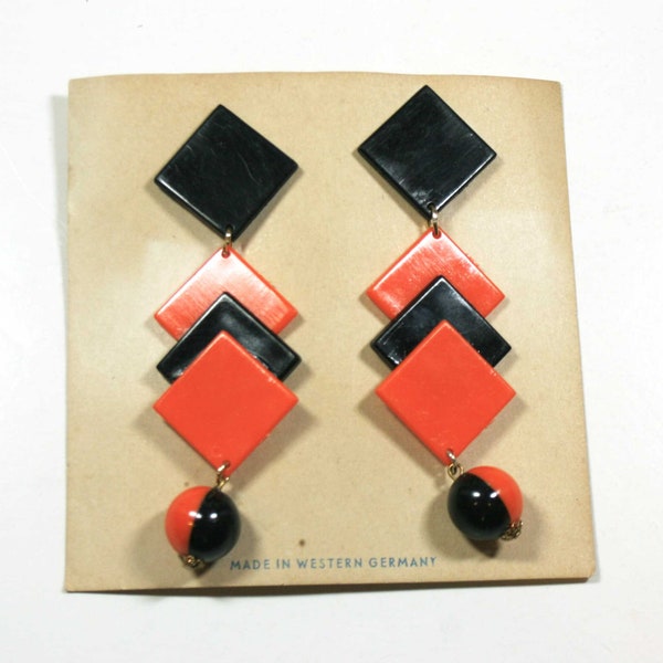 New Vintage Mod 1960's West Germany Plastic Dangle Drop Clip-On Earrings Original Card - 2-tone Orange & Black - Signed Mid-Century Earrings