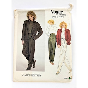 May include: Vintage Vogue Patterns Paris Original sewing pattern featuring Claude Montana designs. The pattern shows a woman wearing a plaid blazer, high-waisted trousers, and a turtleneck. The pattern also shows a woman wearing a red blazer and white trousers.